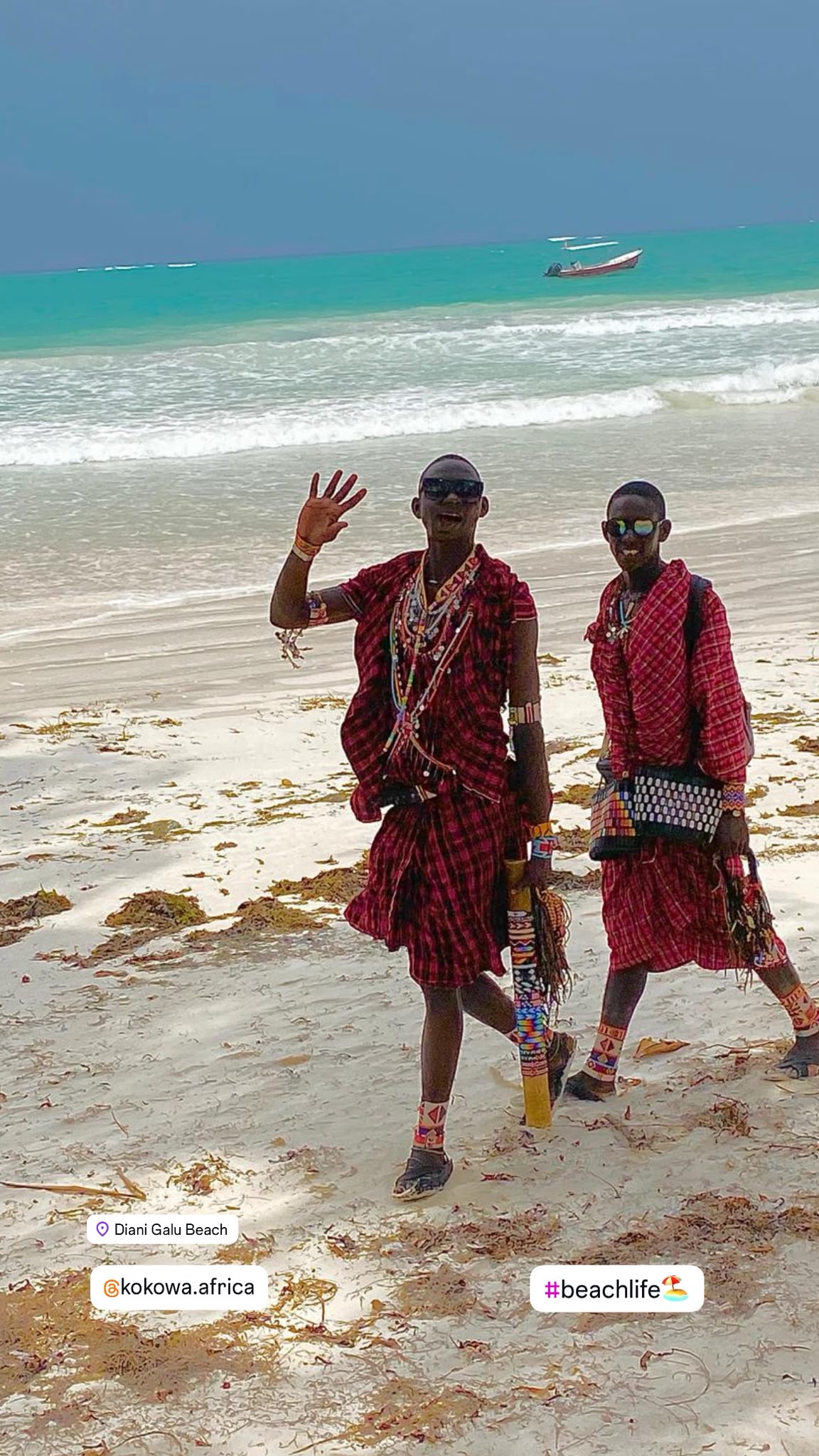 Visitors walking along Diani beach
